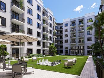 a rendering of an apartment building with a chess board in the middle of a grassy area at Leena Plantation, Plantation, 33322